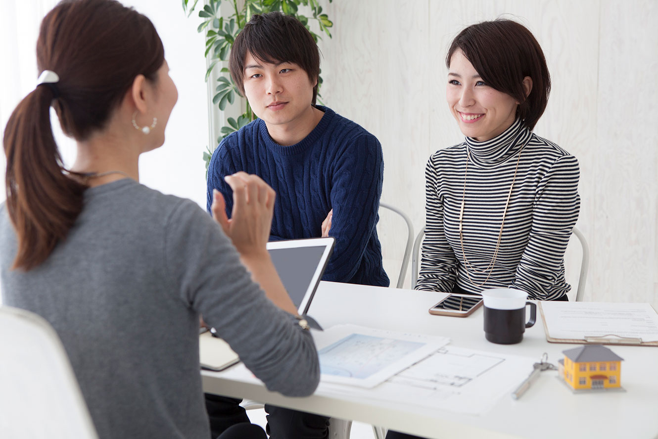 Young couple meeting with financial advisor
