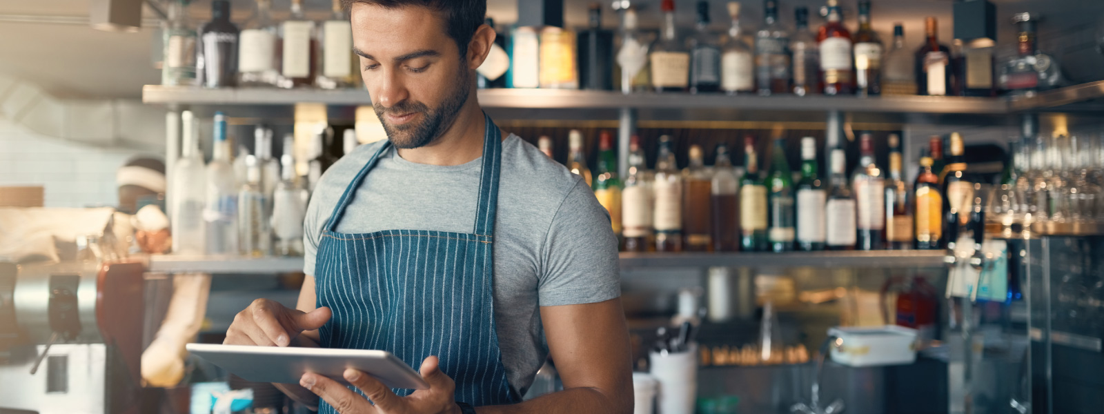 business owner using a tablet